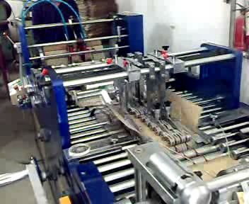 伊寧國(guó)標(biāo)品質(zhì)塑料制品 手機(jī)貼膜紙卡、紙袋與包裝盒制造機(jī)器一站式解決方案